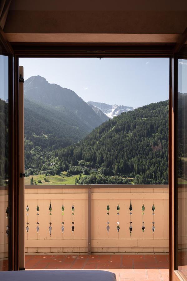 Hotel Vezza Alpine Lodge & Spa Вецца-д'Ольо Экстерьер фото